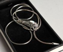 A SILVER SNAKES HEAD NECKLACE