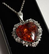 A SILVER AMBER SET, HEAVY SHAPED NECKLACE.