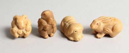 FOUR CARVED BONE NETSUKES.