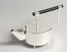 A PLATED ROUND SHAPE CHRISTOPHER DRESSER STYLE PLATED TEAPOT. 8.5ins long.