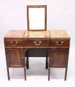 A GENTLEMAN'S GILLOWS OF LANCASTER MAHOGANY DRESSING TABLE, with rising mirror, flaps to the sides