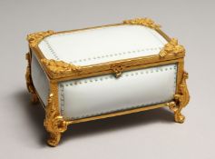 A CONTINENTAL WHITE PORCELAIN CASKET with a hinged lid and gilt mounts. 5.5ins long.