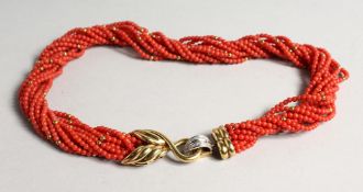 A SUPERB ELEVEN STRAND TWIST CORAL NECKLACE with 18ct gold and diamond clasp.