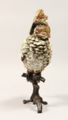 A COLD CAST BRONZE COCKATOO on a branch 12ins high