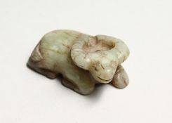 A CARVED JADE BUFFALO