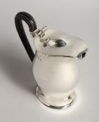 A HOT WATER JUG AND COVER with wooden handles Sheffield 1904, maker Huttons, Weight 17ozs.