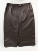A HERMES LEATHER SKIRT, never worn.