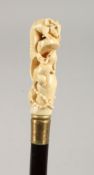A WALKING STICK, the bone handle carved as rats.