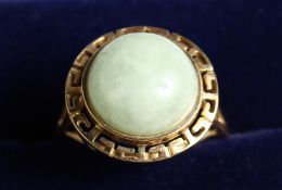 A GOLD AND JADE RING