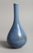 A SMALL CHINESE BLUE GROUND VASE with tall neck 5.5ins high.