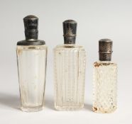 THREE SMALL GLASS SILVER TOP SCENT BOTTLES
