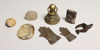 A BELL SEAL, TWO ISLAMIC HANDS, TWO SEALS AND THREE VARIOUS PIECES.