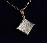 A 9CT GOLD AD DIAMOND PENDANT on a chain.