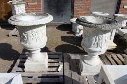 A VERY GOOD PAIR OF ITALIAN CARVED WHITE MARBLE CAMPAGNA URNS ON STANDS 2ft 5in high, stand 2ft