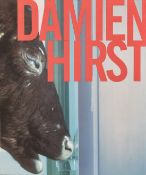A box of Damien Hirst memorabilia including two signed books (Q).
