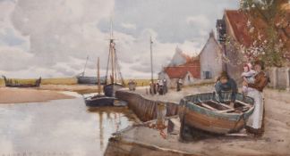 Hubert Coop R.B.A (1872-1953) British, Coastal scene with boats and figures on the quay,