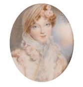 A oval portrait miniature of a Young Lady in a diamant frame, 2.25