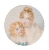 A circular portrait of a Mother and Child in a diamante frame, 1.25