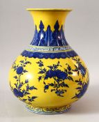 A CHINESE YELLOW GROUND YUHUCHUNPIN PORCELAIN VASE, the body depicting peach blossom in blue, 27cm