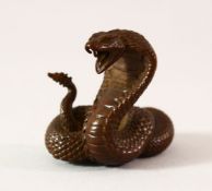 A JAPANESE BRONZE SNAKE, 4cm high.