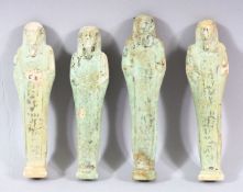 A LOT OF FOUR ANCIENT EGYPTIAN POTTERY USHABTI FIGURES - Each with a turquoise glaze and Egyptian