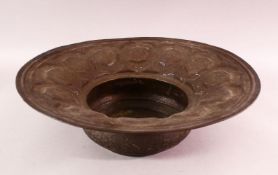A LARGE 18TH CENTURY DAMASCUS MAMLUK REVIVAL BRASS BASIN, with traces of silver inlay, with embossed