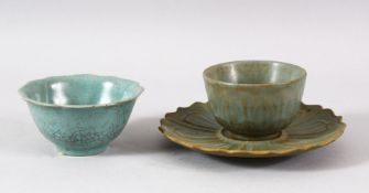 A CHINESE CELADON CUP AND SAUCER, together with a crackle ware cup (3).