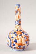 A SMALL IMARI STYLE PORCELAIN BOTTLE VASE, 16cm high.