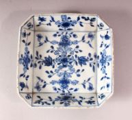AN 18TH CENTURY CHINESE BLUE & WHITE FLORAL DISH - decorated with native flora, 14cm