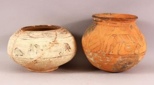 TWO INDUS VALLEY CERAMIC VASES, both painted with animals and stylised motifs, 18.5cm high and