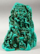 AN UNUSUAL CHINESE TURQUOISE COLOUR MOUNTAIN GROUP, depicting playful monkeys, 21cm.