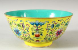 A CHINESE FAMILLE JAUNE PORCELAIN BOWL, the interior with turquoise ground, the exterior painted