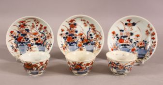 A MIXED LOT OF THREE CHINESE IMARI TEA BOWLS & SAUCERS - Each decorated in similar style with