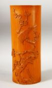 A CHINESE CARVED BAMBOO BRUSH POT - decorated with scenes of birds upon tree branches, 28cm