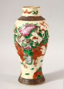 A SMALL CHINESE CRACKLE WARE VASE, painted with warriors, 21.5cm high.