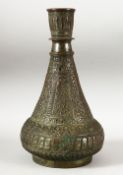 A LARGE TINNED COPPER VESSEL / HUQQA BASE, with profusely chased decoration, 29cm high.