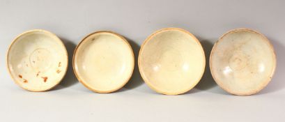 FOUR CHINESE TERRACOTTA BOWLS, various sizes, approx. 16cm diameter.