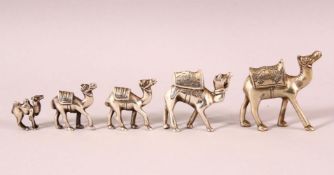 A GROUP OF 5 925 MARKED SILVER COLOURED TURKISH GRADUATED CAMEL FIGURES, the larger with a more