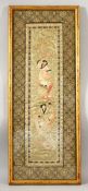 A CHINESE EMROIDERED PANEL, depicting playful children, 60cm x 23cm.