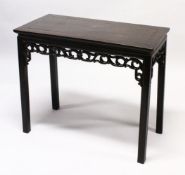 A LATE 19TH / EARLY 20TH CENTURY CHINESE HARDWOOD RECTANGULAR TABLE, with entwined carved and