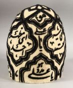 A GOOD PERSIAN QAJAR EMBROIDERED FELT SUFI DERVISH HAT, approx. height 21cm, approx. diameter 18cm.