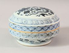 A CHINESE BLUE AND WHITE PORCELAIN BOX AND COVER, the cover depicting phoenix, 14cm diameter.