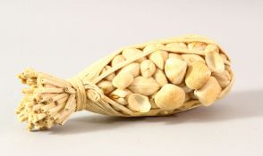 A GOOD EARLY 20TH CENTURY JAPANESE CARVED IVORY OKIMONO, carved by Toshio