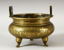 A GOOD CHINESE ENGRAVED / CHASED BRONZE TRIPOD CENSER, decorated with bats and icons, the base