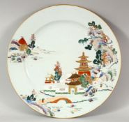A GOOD 19TH CENTURY CHINESE PORCELAIN PLATE, with enamelled decoration depicting a temple and