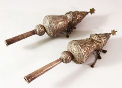 A PAIR OF JEWISH RIMONIM (TORAH FINIALS) , each embossed with floral borders with main central