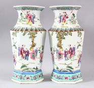 A PAIR OF CHINESE FAMILLE ROSE PORCELAIN HEXAGONAL PORCELAIN VASES - each vase of hexagonal form,