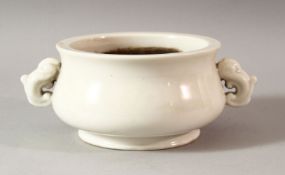 A BLANC DE CHINE TWIN HANDLE PORCELAIN CENSER, 18cm diameter (handle to handle).