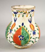 A TURKISH OTTOMAN KUTHAYA POTTERY VASE - decorated with floral motif panels, 12cm