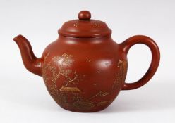 A CHINESE YIXING TEAPOT, the body with calligraphy script, the base with impressed mark, 20cm handle